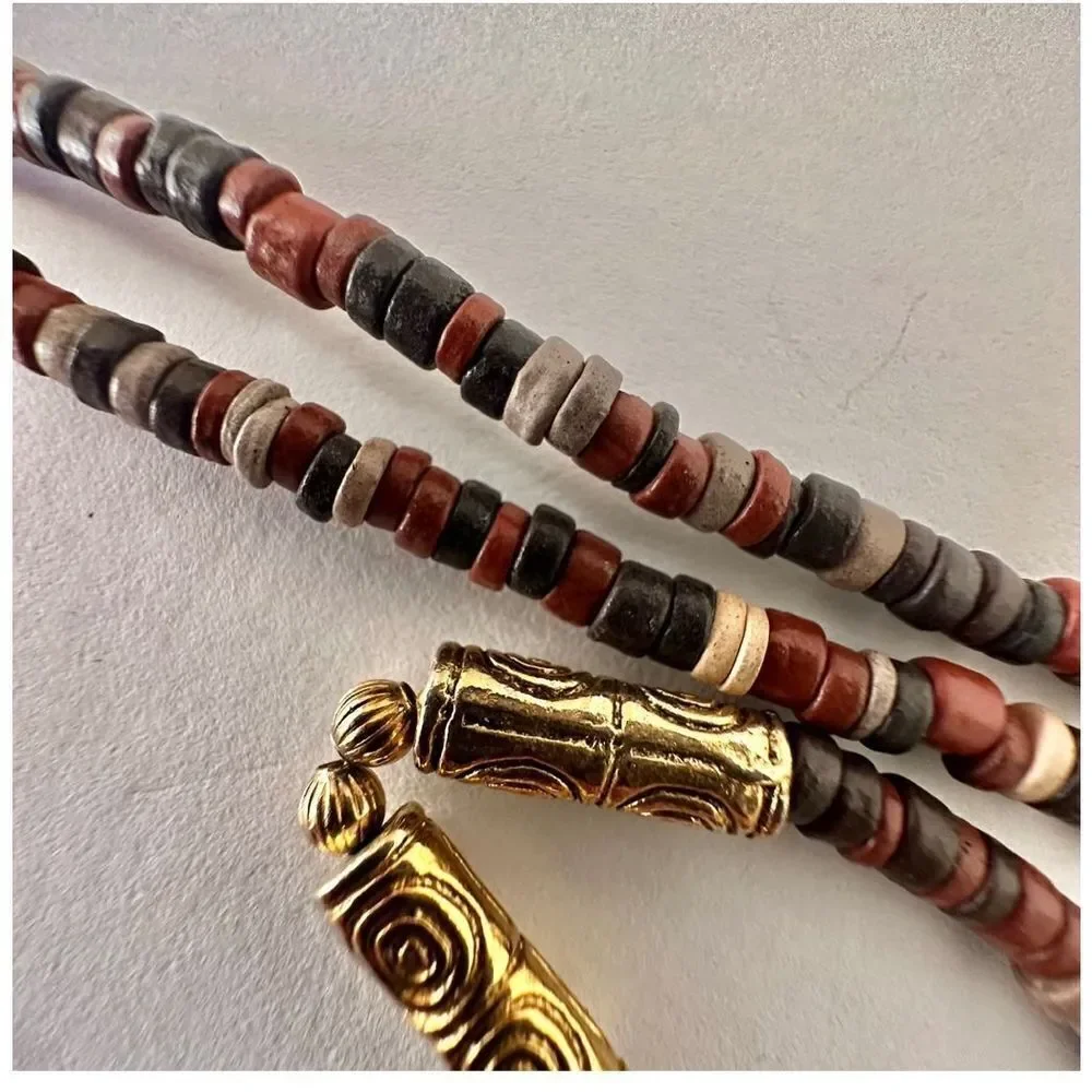 Brown black and gold tone beaded long necklace